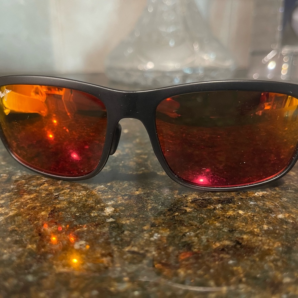 Huelo Maui Sunglasses. Red Lava lenses. Brand new in original box with case